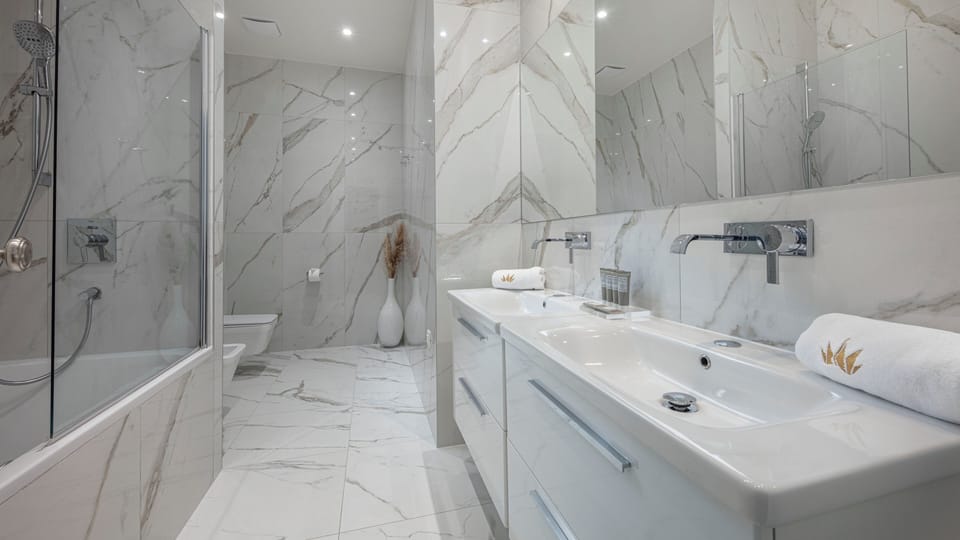 Executive Double Room, Balcony, Sea View | Bathroom | Shower, free toiletries, hair dryer, bathrobes