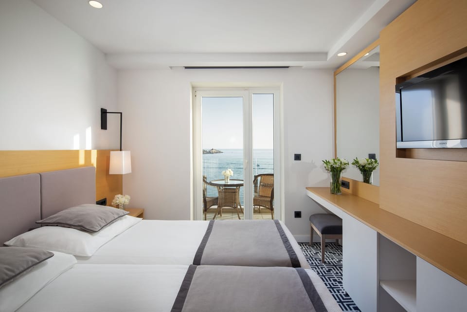 Panoramic Double or Twin Room, Balcony, Sea View | Hypo-allergenic bedding, minibar, in-room safe, desk
