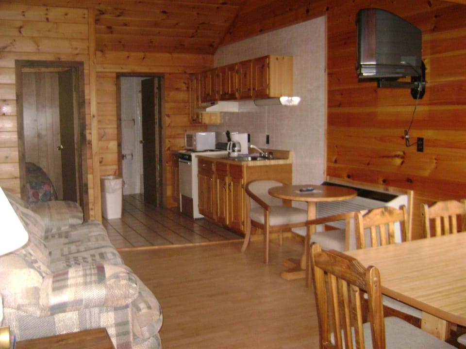 Deluxe Cottage, 2 Bedrooms | Private kitchen | Fridge, microwave, coffee/tea maker, cookware/dishes/utensils