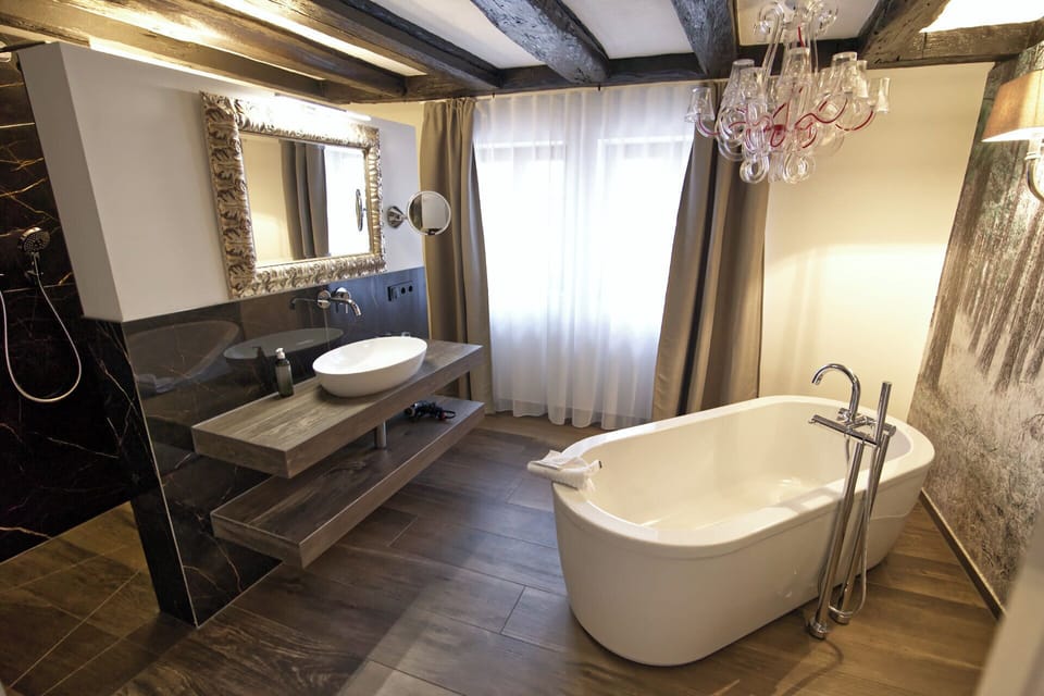 Junior Studio Suite, 1 King Bed, Patio, Garden View | Pillowtop beds, desk, blackout drapes, free WiFi