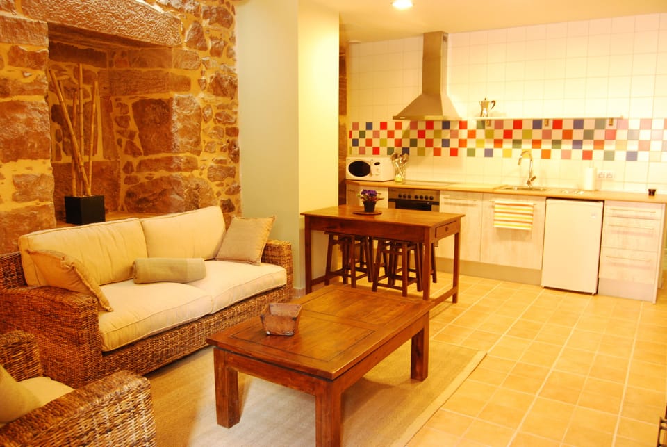 Superior Apartment, 2 Bedrooms, Kitchen, Mountainside | Living area | 24-inch TV with digital channels, heated floors