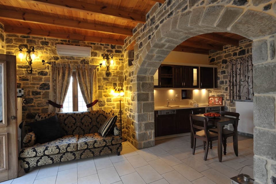 Villa, 2 Bedrooms, Sea View (Kalysto) | Living area | 22-inch flat-screen TV with satellite channels, TV, fireplace