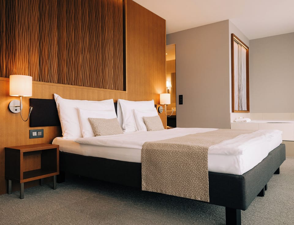 Premium bedding, in-room safe, desk, soundproofing