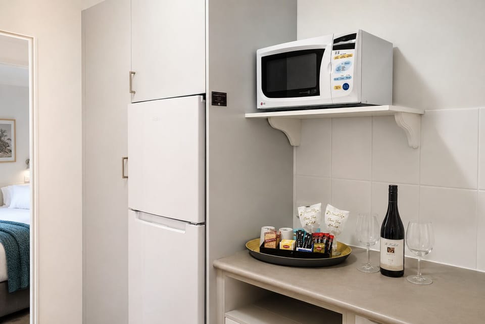 Microwave, toaster, highchair, cookware/dishes/utensils