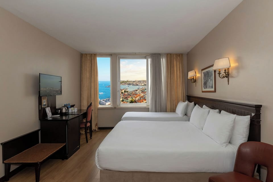 Hypo-allergenic bedding, minibar, in-room safe, desk