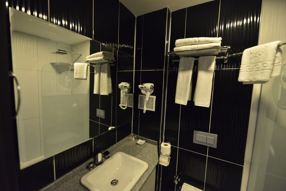 Shower, free toiletries, hair dryer, bathrobes