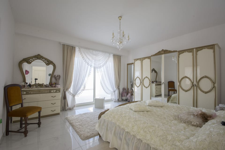 Deluxe Suite, Ocean View | Down comforters, in-room safe, individually decorated