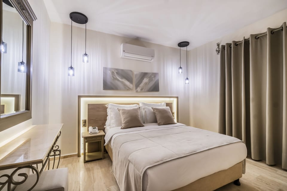 Exclusive Suite, Balcony, Sea View | Minibar, in-room safe, free WiFi, bed sheets