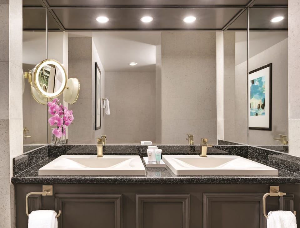 Shower, eco-friendly toiletries, hair dryer, towels