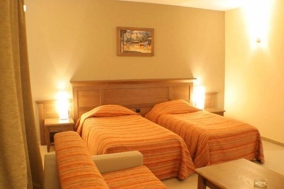 Desk, blackout drapes, iron/ironing board (on request), WiFi (free)