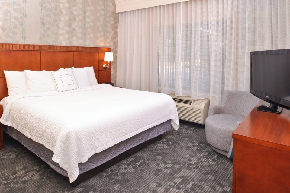 Premium bedding, desk, blackout drapes, iron/ironing board