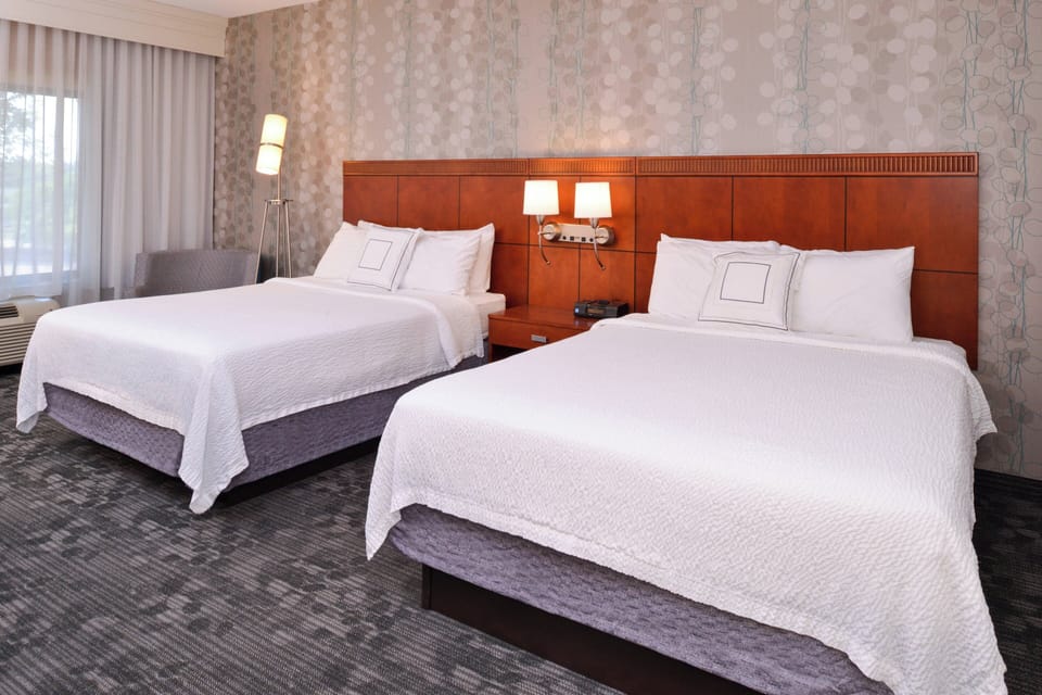 Premium bedding, desk, blackout drapes, iron/ironing board