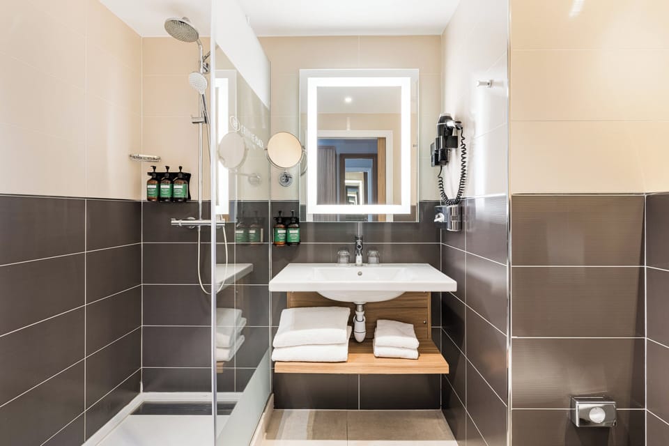 Premium Room, 1 Queen Bed, Balcony | Bathroom | Designer toiletries, hair dryer, towels, soap