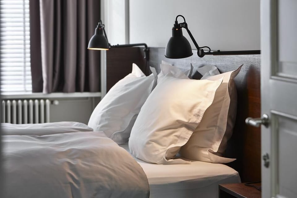 Premium bedding, down comforters, minibar, desk