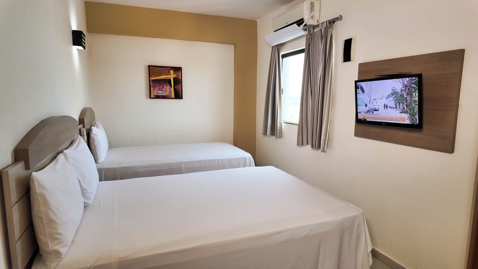 Standard Triple Room | Minibar, desk, blackout drapes, WiFi (free)