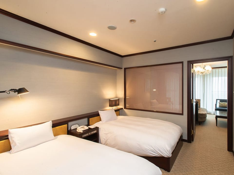 Suite Twin Non Smoking | Minibar, free WiFi, bed sheets