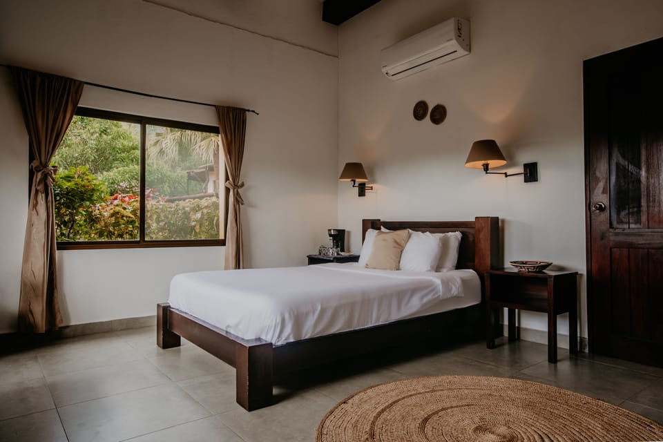 Deluxe Double Room, 1 Queen Bed | Premium bedding, in-room safe, iron/ironing board (on request)