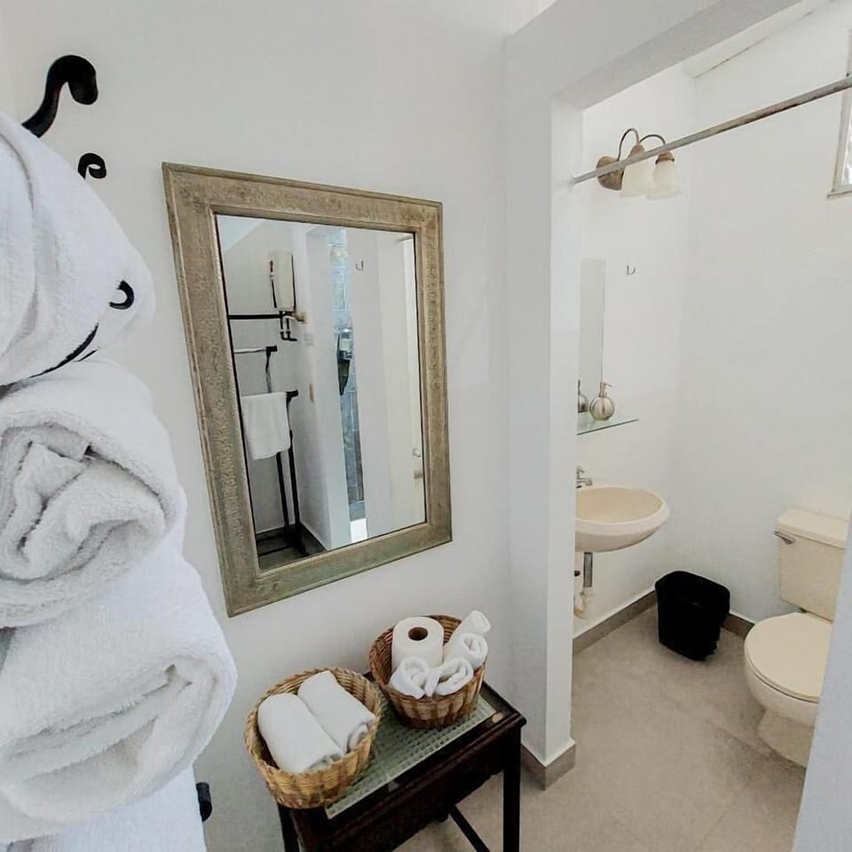 Family Suite, 2 Bedrooms | Bathroom | Shower, free toiletries, hair dryer, towels