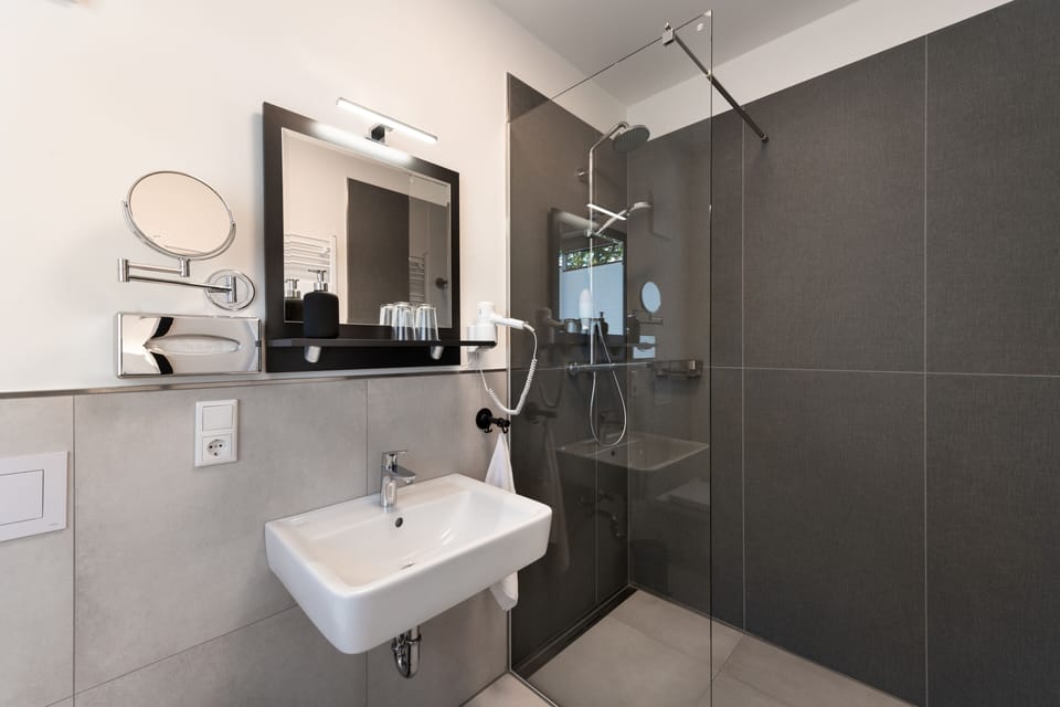 Shower, free toiletries, hair dryer, towels