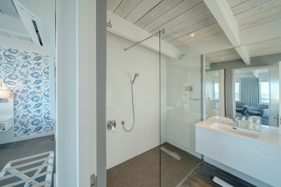 Premium Suite, Sea View | Bathroom | Shower, designer toiletries, hair dryer, bathrobes
