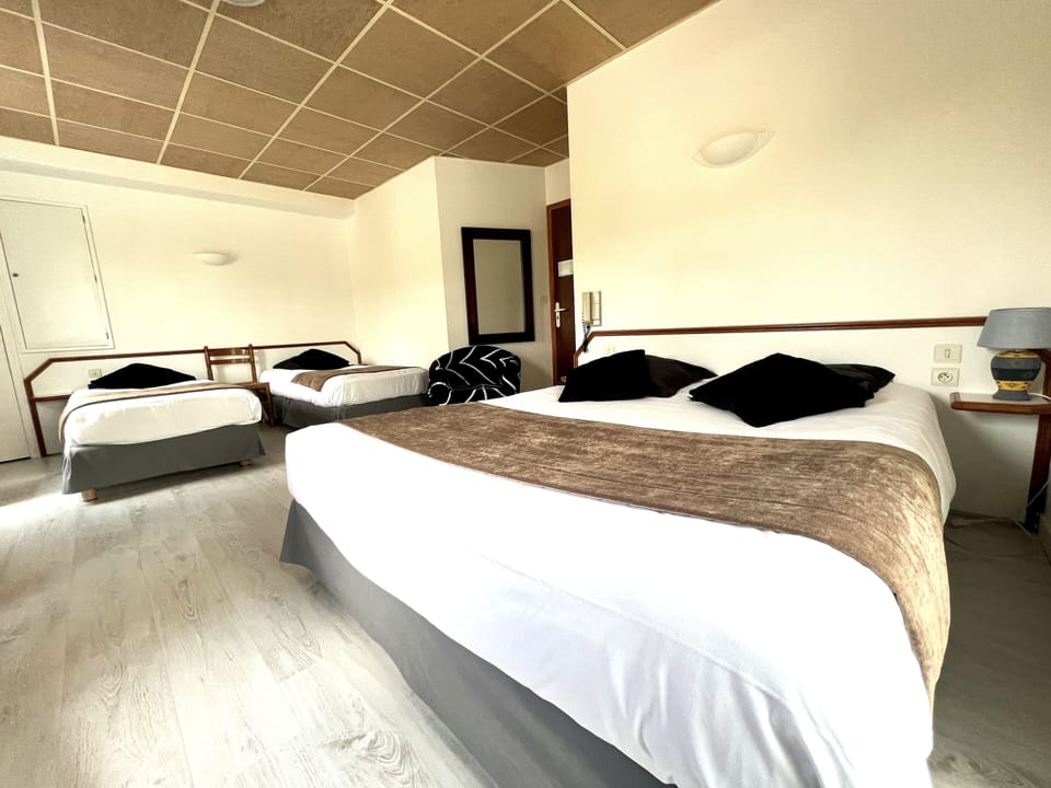 Family Room, Multiple Beds | Premium bedding, desk, laptop workspace, iron/ironing board