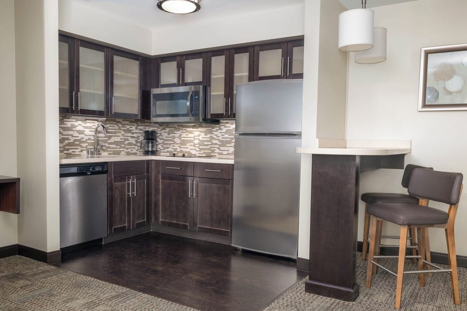Suite, 1 Bedroom, Kitchen | Private kitchen | Full-size fridge, microwave, coffee/tea maker, cookware/dishes/utensils