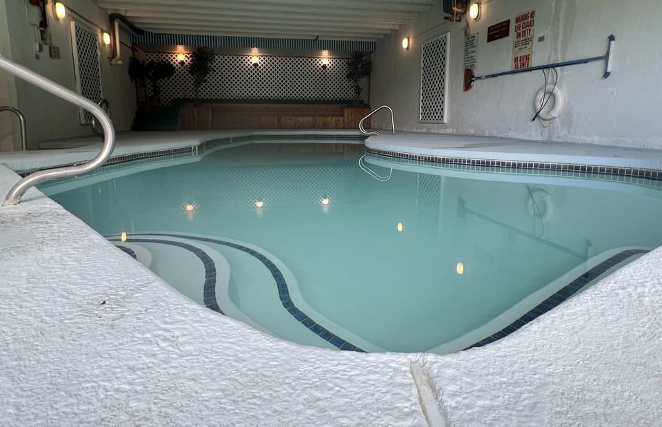 Indoor pool, seasonal outdoor pool, pool umbrellas, sun loungers
