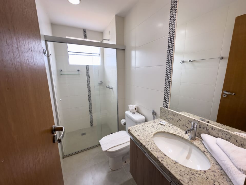 Family Apartment | Bathroom | Shower, free toiletries, hair dryer, towels
