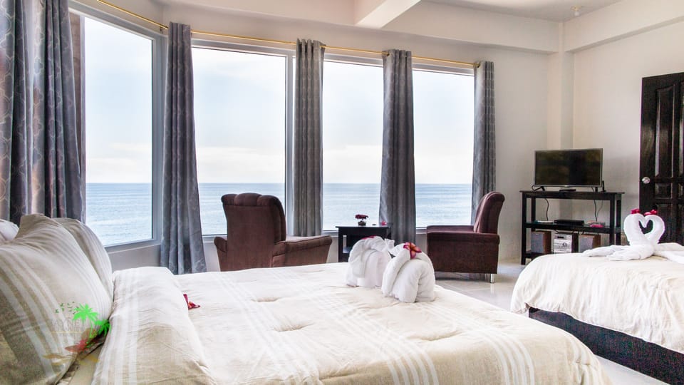 Family Room, 2 Queen Beds, Ocean View | Egyptian cotton sheets, premium bedding, desk, laptop workspace