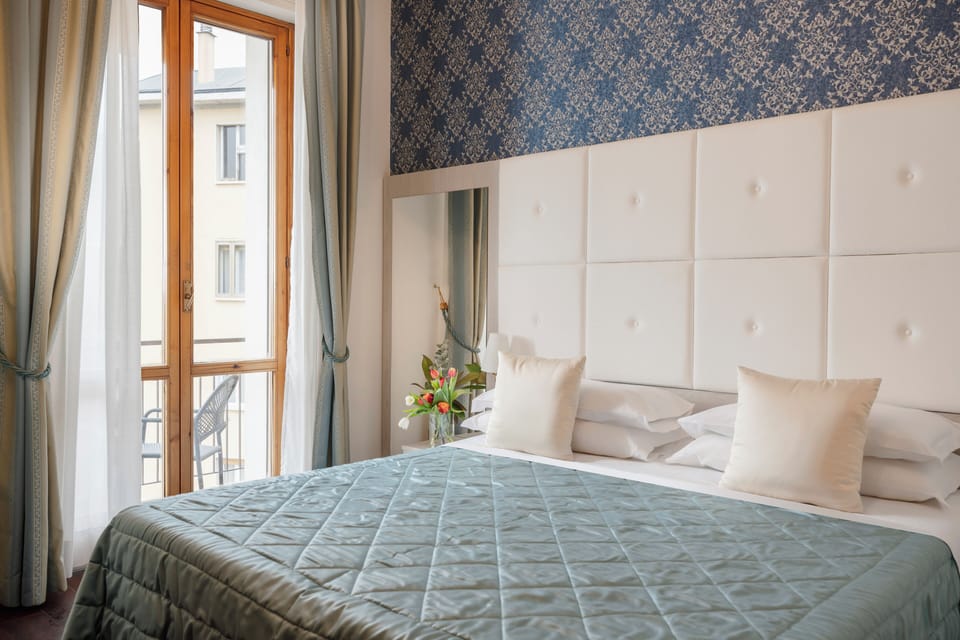 Room, Terrace, City View | Down comforters, minibar, in-room safe, desk