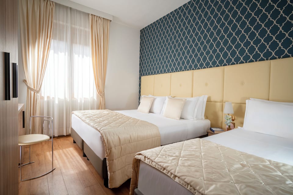 Classic Triple Room | Down comforters, minibar, in-room safe, desk