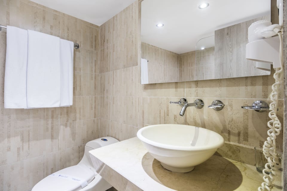 Shower, free toiletries, hair dryer, towels