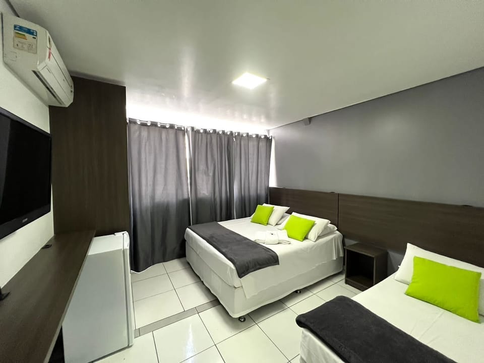 Standard Room | Minibar, blackout drapes, iron/ironing board, free WiFi
