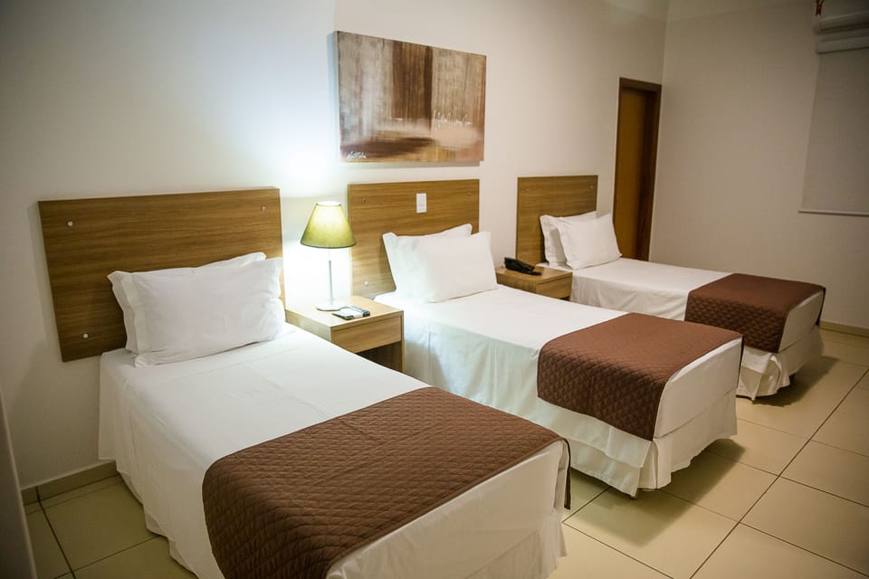 Luxury Twin Room, 1 Bedroom | Minibar, desk, blackout drapes, iron/ironing board