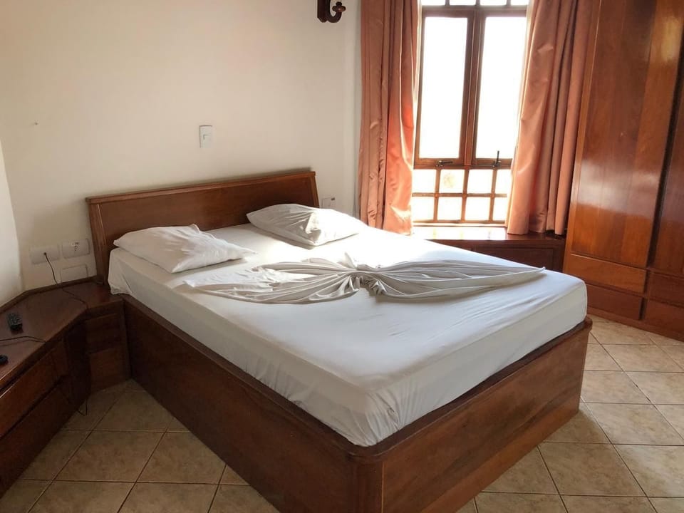 Deluxe Room | 2 bedrooms, minibar, blackout drapes, free WiFi