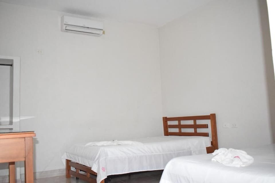 Desk, laptop workspace, WiFi (free), bed sheets