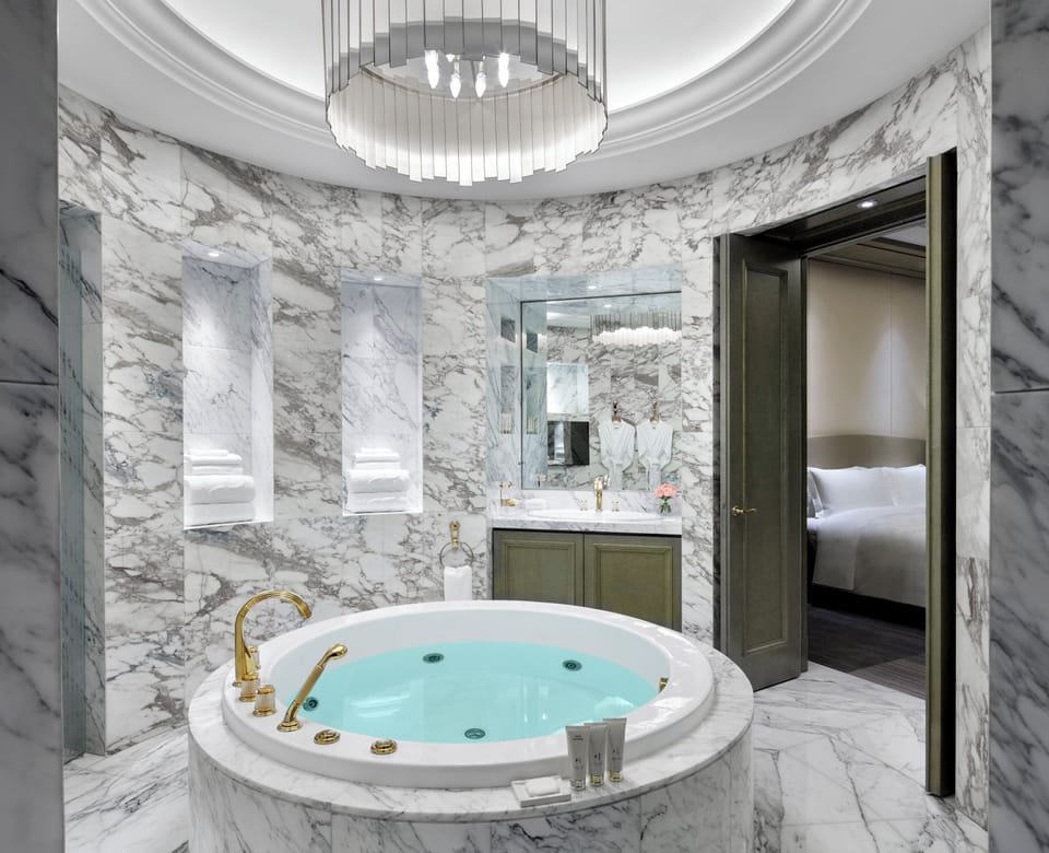 Separate tub and shower, free toiletries, hair dryer, bathrobes