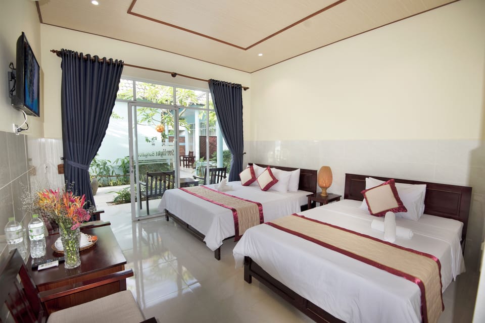 Triple Bungalow | Minibar, in-room safe, individually decorated, individually furnished