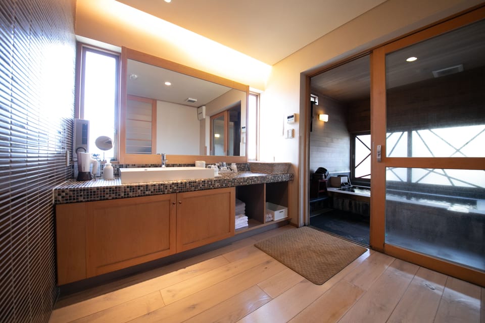 Detached room Karin, Non Smoking (Japanese Western with Exclusive hot spring) | Bathroom | Separate tub and shower, spring water tub, free toiletries, hair dryer