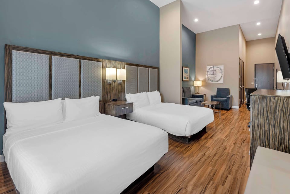 Suite, 2 Queen Beds, Accessible, Bathtub (with Sofabed) | Pillowtop beds, desk, laptop workspace, blackout drapes