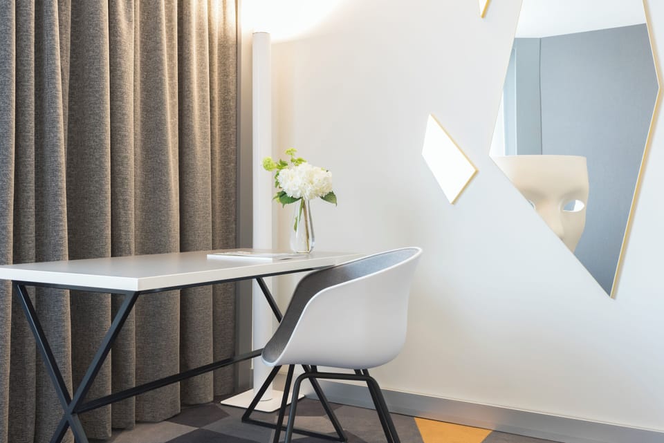 Premium bedding, down comforters, pillowtop beds, in-room safe