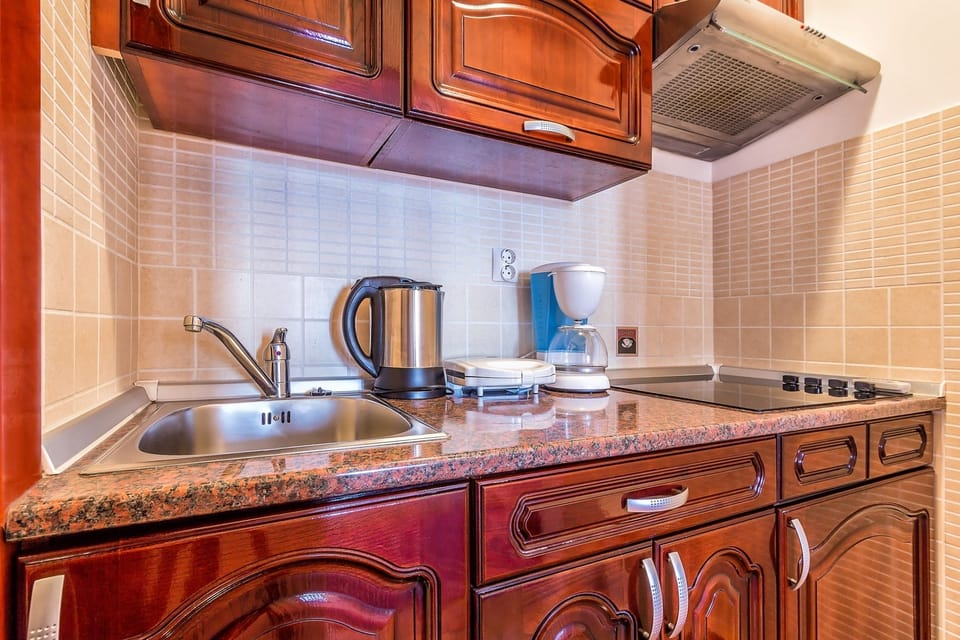 Premium Apartment, 1 Bedroom, 2 Bathrooms, Sea View | Private kitchen | Fridge, stovetop, coffee/tea maker, electric kettle