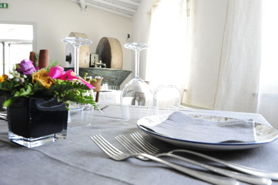 Breakfast, lunch, dinner served; local cuisine 