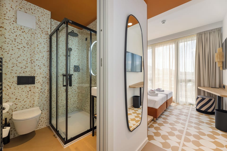 Double or Twin Room, Sea View | In-room safe, free WiFi, bed sheets