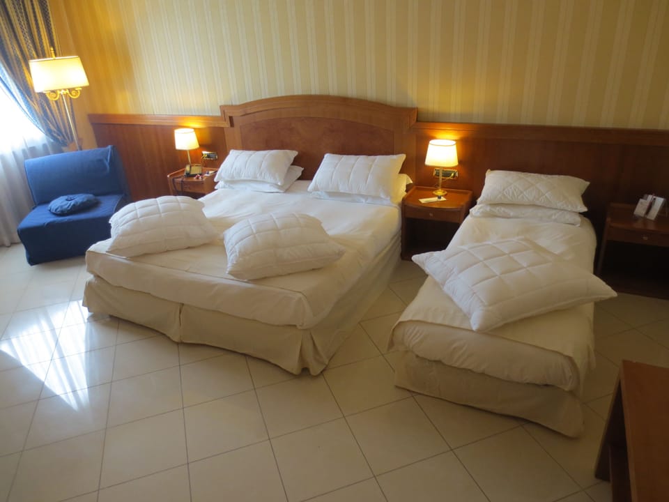 Triple Room | Hypo-allergenic bedding available, minibar, in-room safe, desk