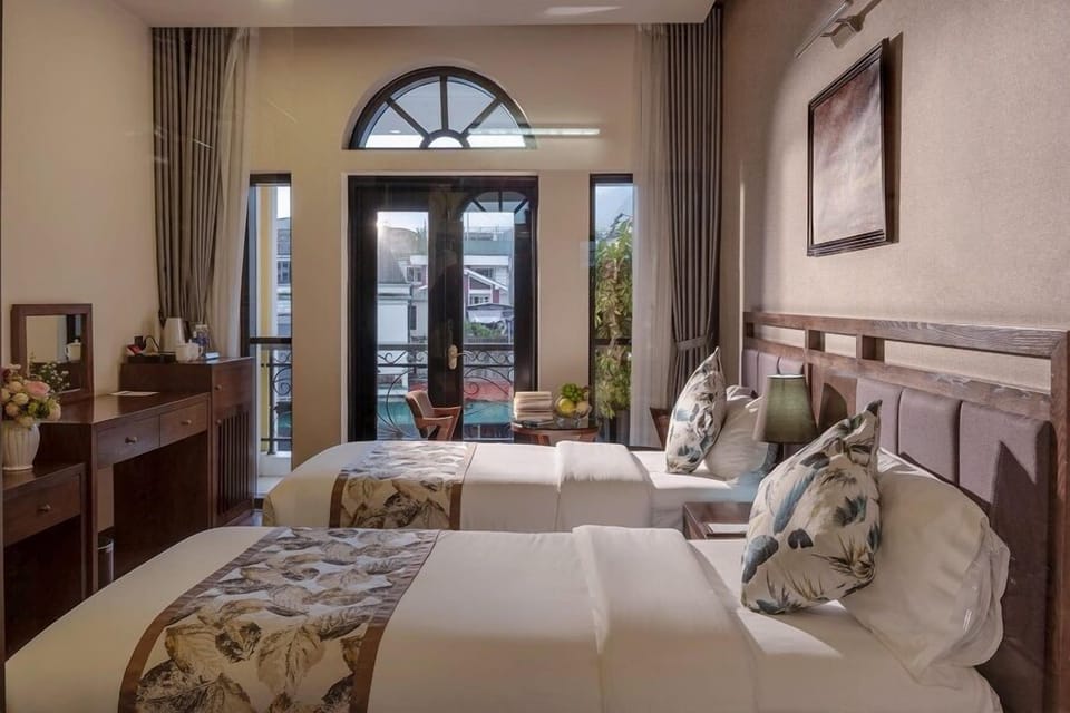 Deluxe Room | Minibar, in-room safe, desk, soundproofing