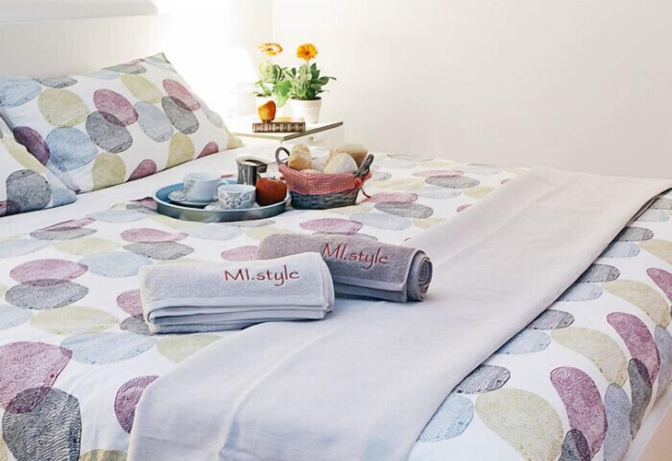 Desk, laptop workspace, free WiFi, bed sheets