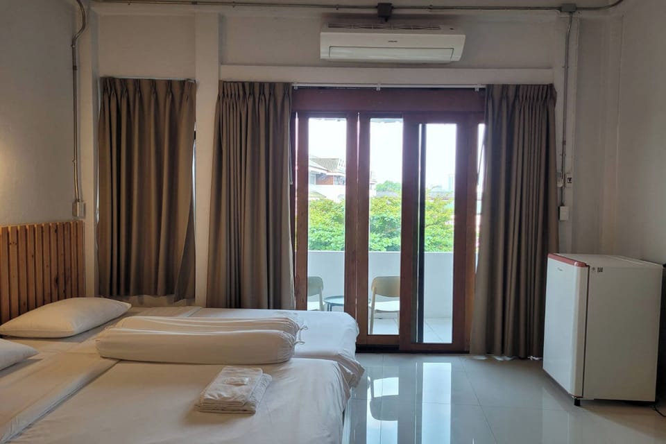 Standard Quadruple Room | Minibar, individually decorated, individually furnished, desk