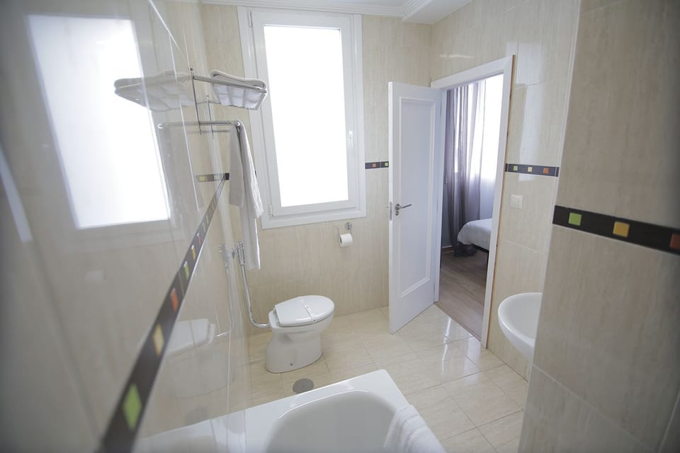 Double or Twin Room | Bathroom | Hair dryer, towels, soap, toilet paper