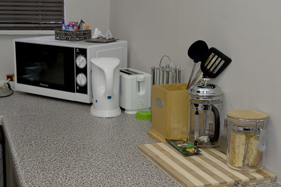 Coffee/tea maker, fridge, microwave, electric kettle